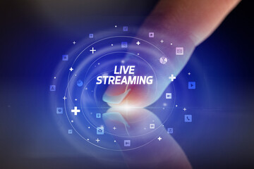 Finger touching tablet with social media icons concept