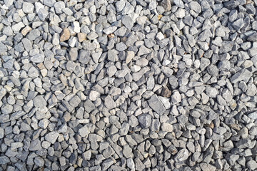 Gravel outdoor  road. Closeup gravel texture. Stone pattern. Small rocks ground background