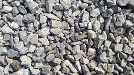 Gravel outdoor  road. Closeup gravel texture. Stone pattern. Small rocks ground background