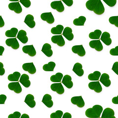 seamless pattern of clover leaves, natural background with green leaves