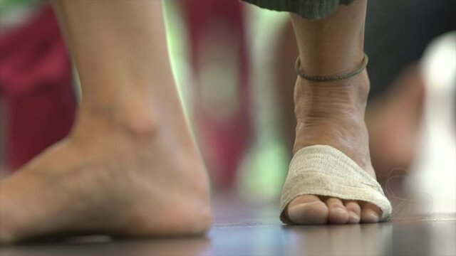 close-up of dancer feet stepping on the floor. low view