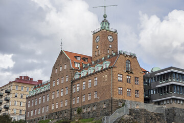 Old red brick building of Navigation school (Navigationsskolan) with time ball in the tower. Gothenburg, Sweden.