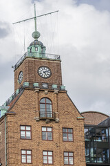 Fototapeta na wymiar Old red brick building of Navigation school (Navigationsskolan) with time ball in the tower. Gothenburg, Sweden.