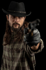 Obraz premium Cowboy with guns. Studio shooting