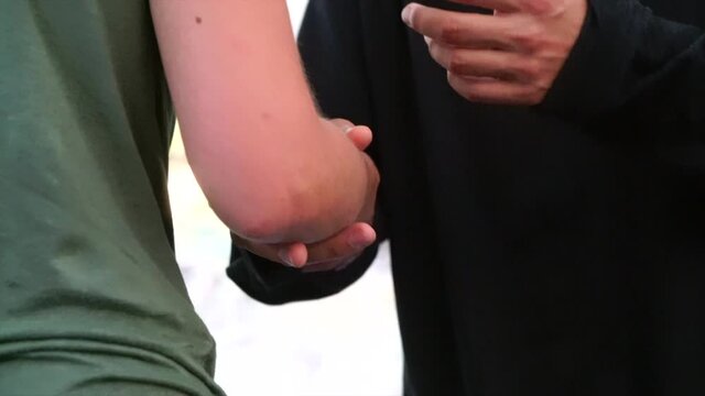 dancer close-up contact with hands
