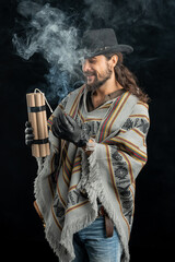 Cowboy with guns. Studio shooting