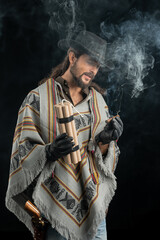 Fototapeta premium Cowboy with guns. Studio shooting