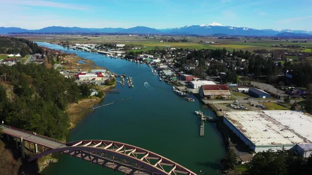 Aerial View of the city of La Conner, Washington and the Rainbow Bridge. Located in the Skagit Valley this popular tourist town is noted for the historic Rainbow Bridge and many shopping opportunities
