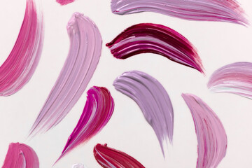 Lilac paint strokes on white.Abstract background.
