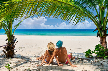 Couple on a tropical beach at Tioman Island