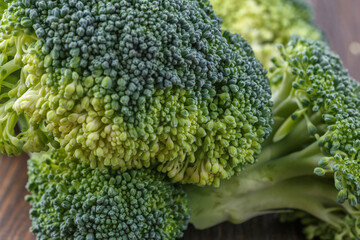  A lot of broccoli for diet and healthy eating. Fresh green broccoli on a   table.Broccoli...