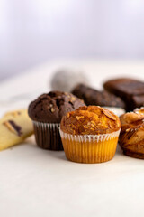 Delicious Muffin With Sweet Pastries In Background. Selective focus.
