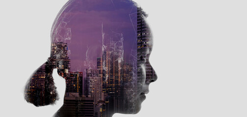 Double exposure of Asian woman silhouette and modern renewable city skyline background.Energy...