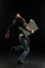 Cowboy with guns. Studio shooting