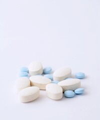 Fototapeta na wymiar Pills on white background