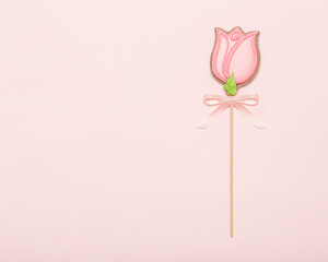 Gingerbread in the shape of a tulip. festive creative card. concept for women in spring