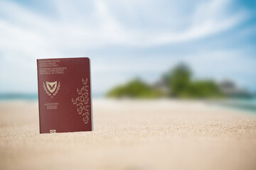 Cyprus passport on the beach sand ,Space for writing