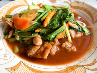 Chinese food made by Balinese. Pork mixed with flour, plus vegetables and seasonings. Named 