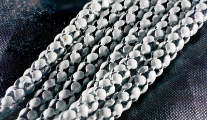 Costume jewelry made of fake gold and silver and artificial gemstones photographed in the studio