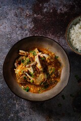 Homemade Singapore chilli crab served with jasmine rice, selective focus