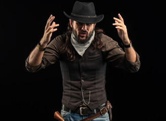 Cowboy with guns. Studio shooting