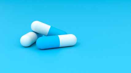 Three Medical pills on blue background with copy space. 3D render illustration.