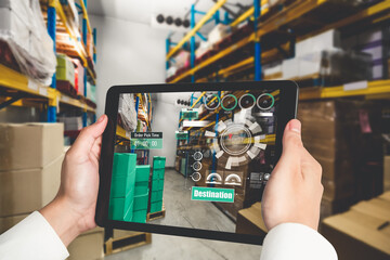 Smart warehouse management system using augmented reality technology to identify package picking and delivery . Future concept of supply chain and logistic business .