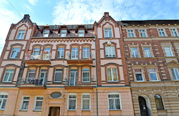 Fototapeta na wymiar The facade of a German-built residential building on Suvorov Street. Chernyakhovsk, Kaliningrad region