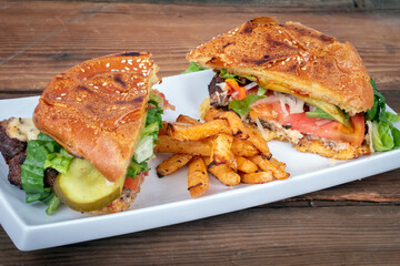 Beef burger closeup with home made turnip fries