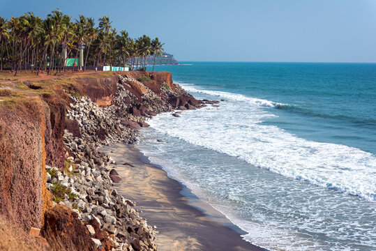 Varkala, Kerala, India. Steep coast, palm trees and sea horizon. 2 km away from the Central Beach.