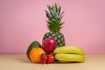 Fruit composition on a colored background