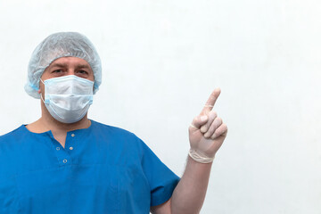 A medical worker wearing white gloves and a mask on a white background