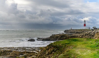 Fototapeta na wymiar lighthouse on the coast with strormy winter skies 8893