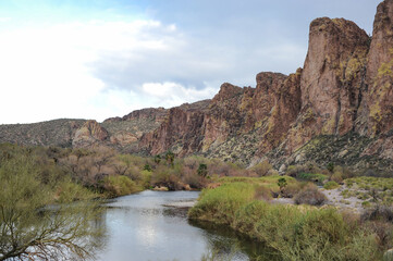 Fototapeta na wymiar Desert river, mountains and vegetation in Sonoran Desert