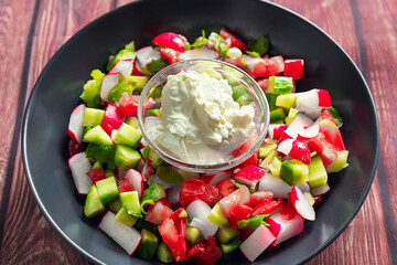 vegetable salad with radishes and cucumbers