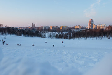 winter day in the city park with snow