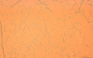 Glossy wet table surface with scratches, scuffs in sunlight. Selective focus, macro, white balance offset.