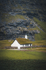 The old Lutheran church in Saksun village with view over the saksun falley on the island of Streymoy, Faroe Islands, Denmark