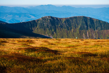 Amazing landscape of green mountain peaks
