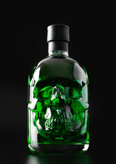 Green skull absinthe bottle on dark background