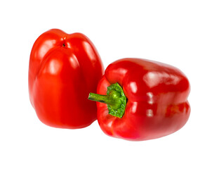 Two red bell peppers isolated on a white background.
