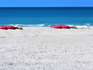 
Sport toys on the beach ready for the water