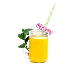 Orange juice and green leaves isolated on a white background.A glass of orange juice and drinking straw. Healthy food.