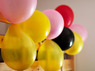 Multi-colored balloons in the children's room. Child's birthday.
