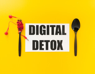 cutlery with digital detox text, top view concept