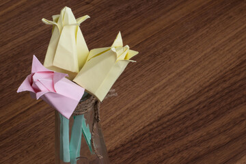 paper tulips in a glass vase