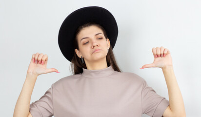 Happy european woman pointing on herself isolated on white background