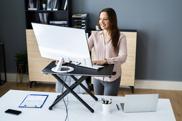 Adjustable Height Desk Stand In Office