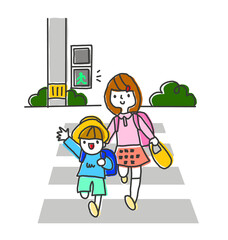 青信号で横断歩道を渡る子供たち