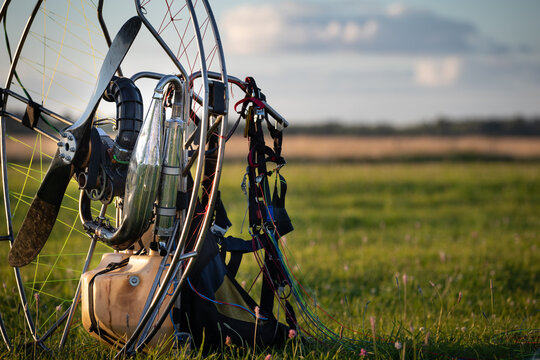 Individual backpack paralet with gasoline engine. Preparation for wing flight. Extreme sports. Paralet and small aircraft.